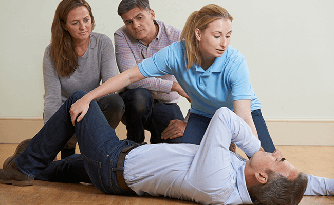 First Aid Training Course Showing the Recovery Position